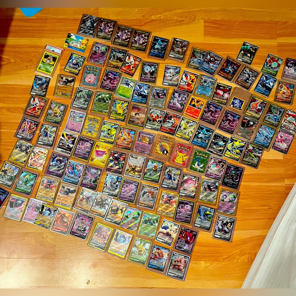 110 Pokémon ex v and vmax cards market value = 1000 selling for 690 need the 💵